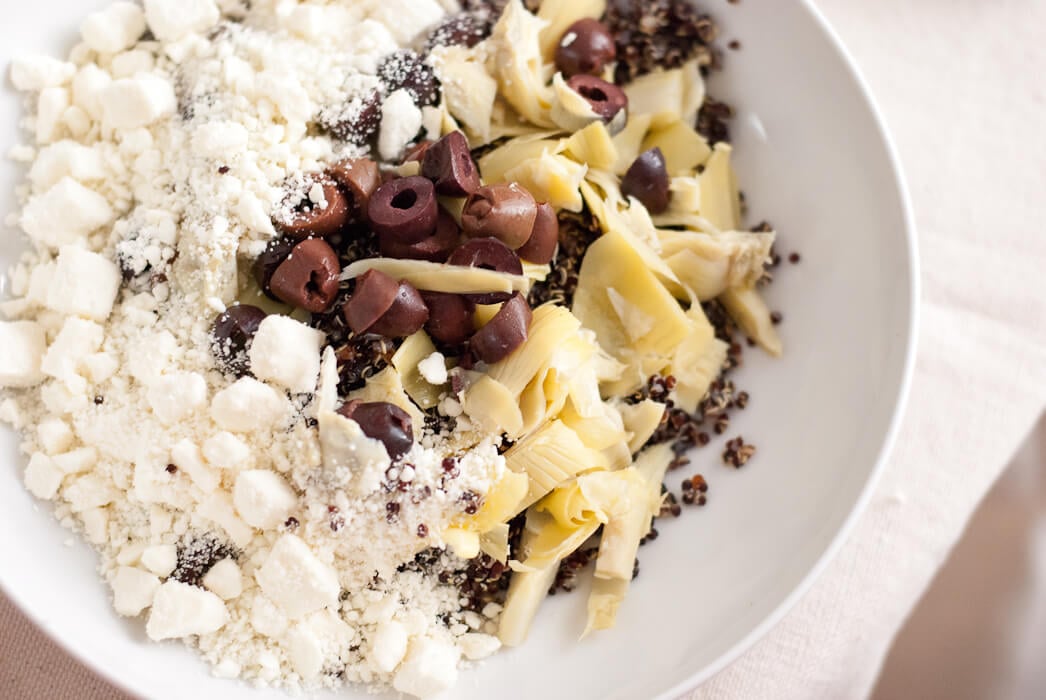tomato stuffing with quinoa, artichoke, feta and kalamata olives