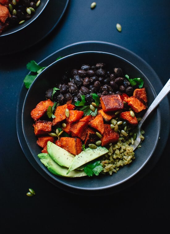 Roasted sweet potatoes with healthy green rice and black beans. Delicious! cookieandkate.com