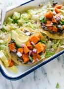 These delicious sweet potato tostadas make a great meatless dinner! Vegetarian, gluten free, and easily vegan.