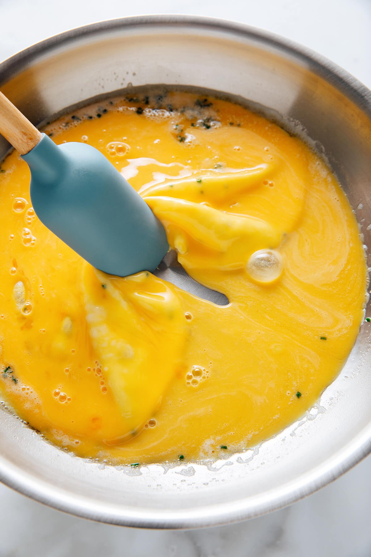 stirring scrambled eggs